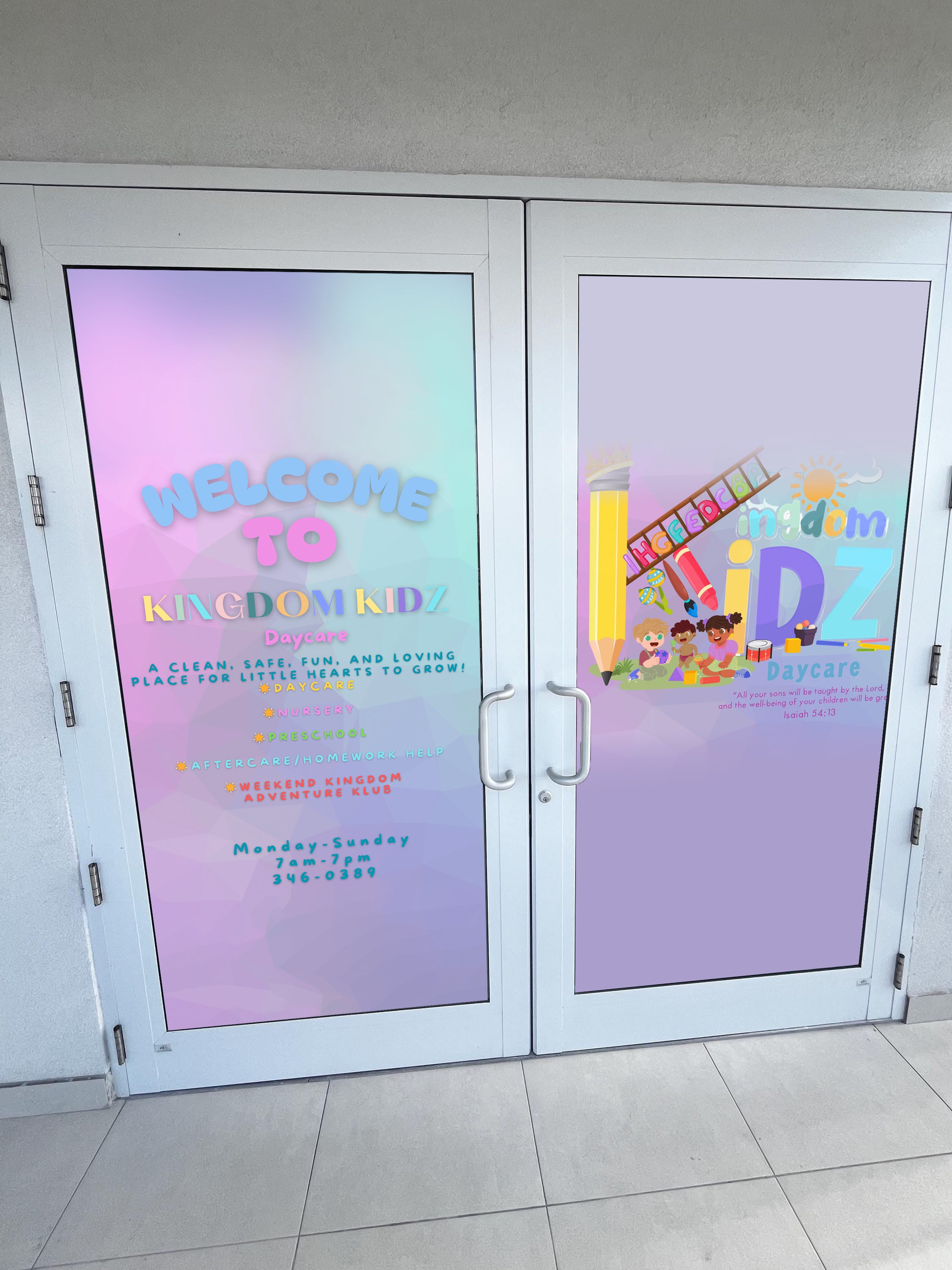 Decorative glass doors with colorful graphics and text, featuring the brand 'Kiddom Kids'.