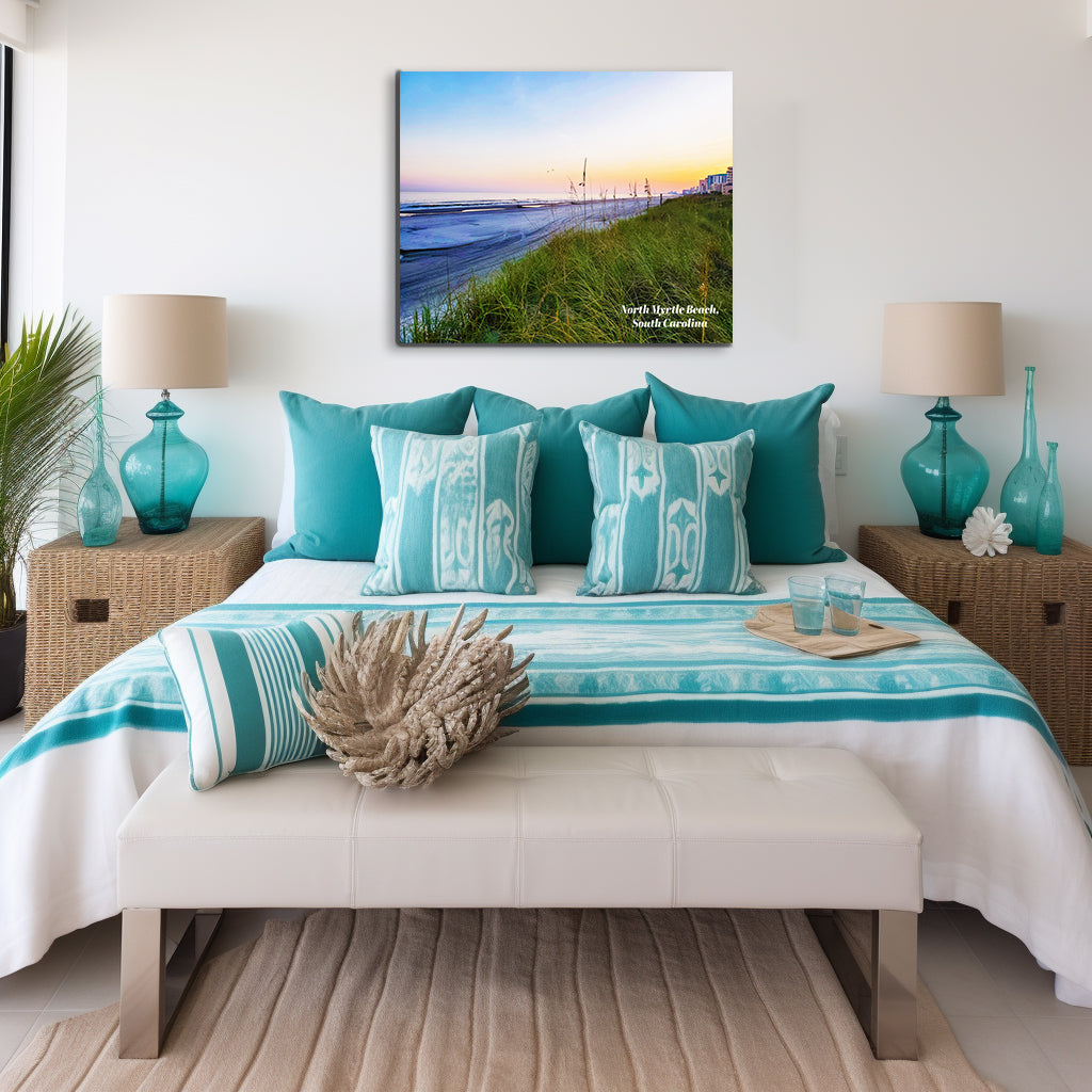 Bedroom with turquoise bedding and decor, featuring a beach scene painting on the wall.