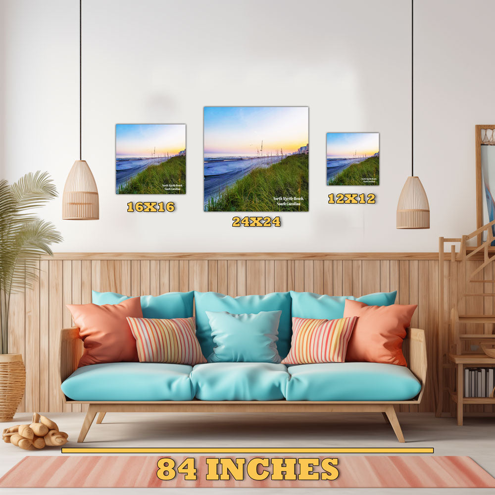 Light blue sofa with colorful cushions in a living room setting, featuring wall art and decor.