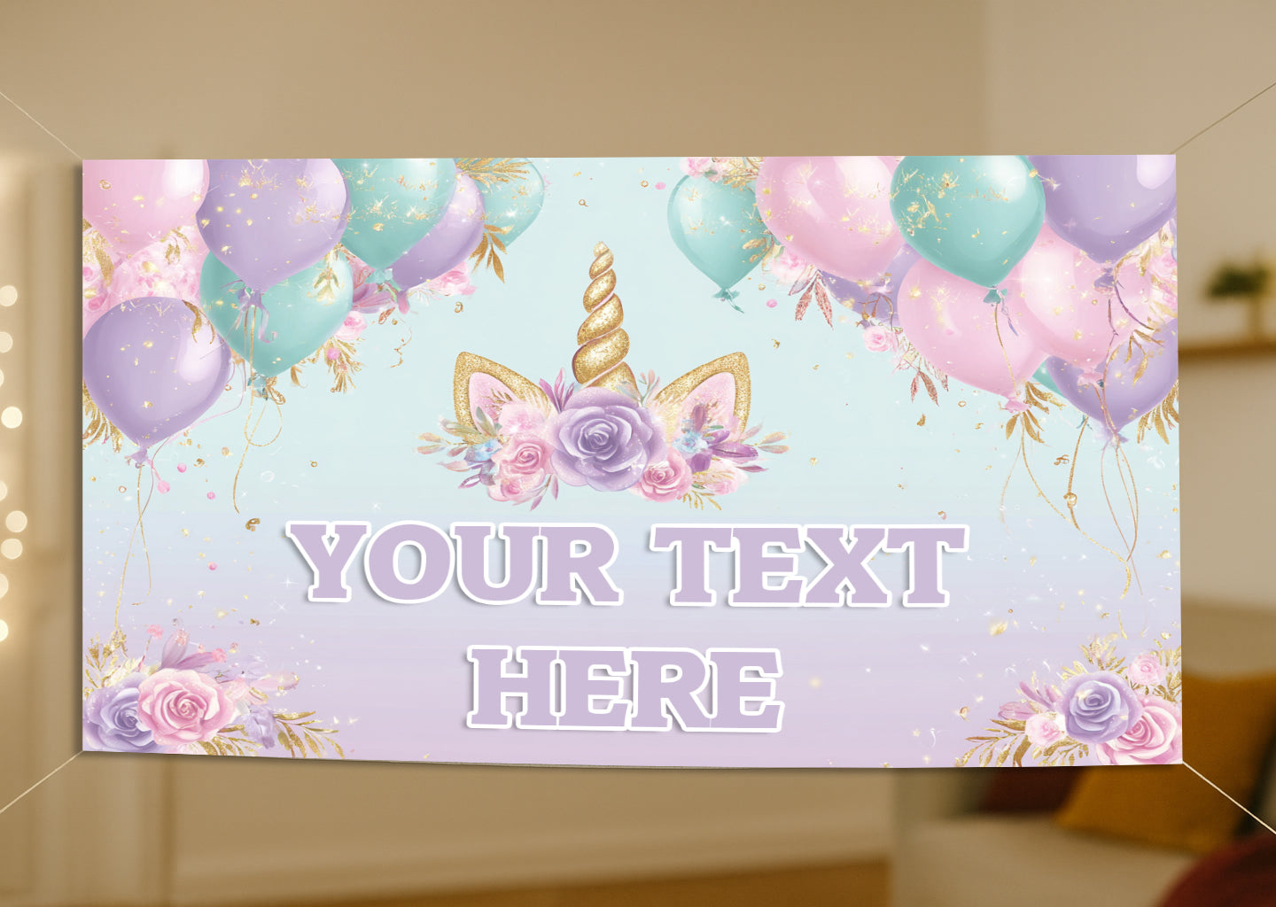 Decorative banner with unicorn horn, balloons, and flowers on a light blue background.