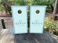 Two cornhole boards with custom wedding cornhole wraps