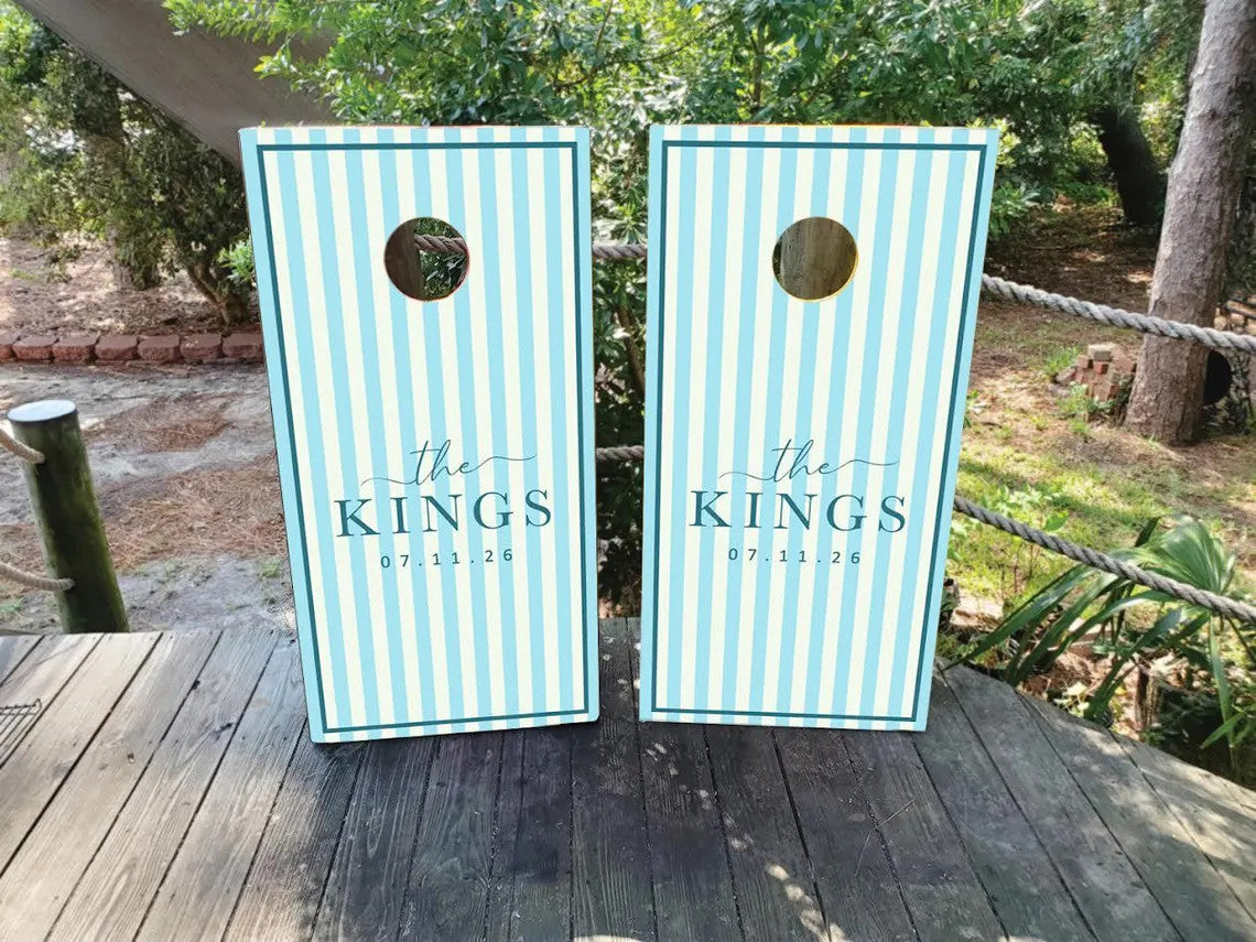 Two cornhole boards with custom wedding cornhole wraps