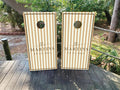 Two personalized wedding cornhole boards 